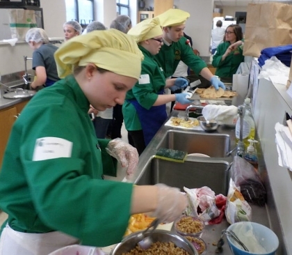 Students handling food
