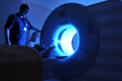 A patient entering an MRI machine